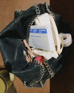 Falabella bag in black filled with stuff