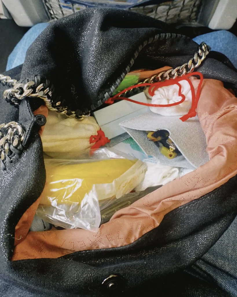 Falabella bag in black filled with stuff