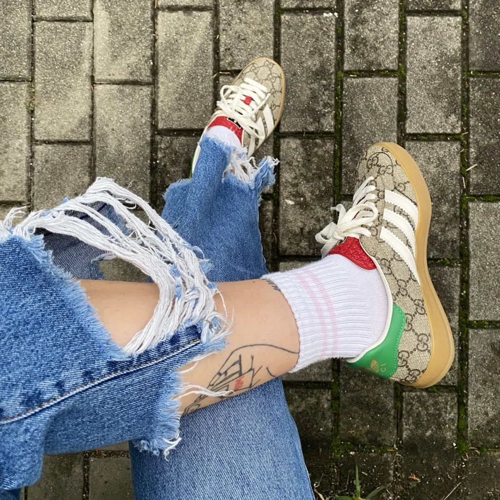 Adidas x Gucci Gazelle in Beige GG Monogram on feet