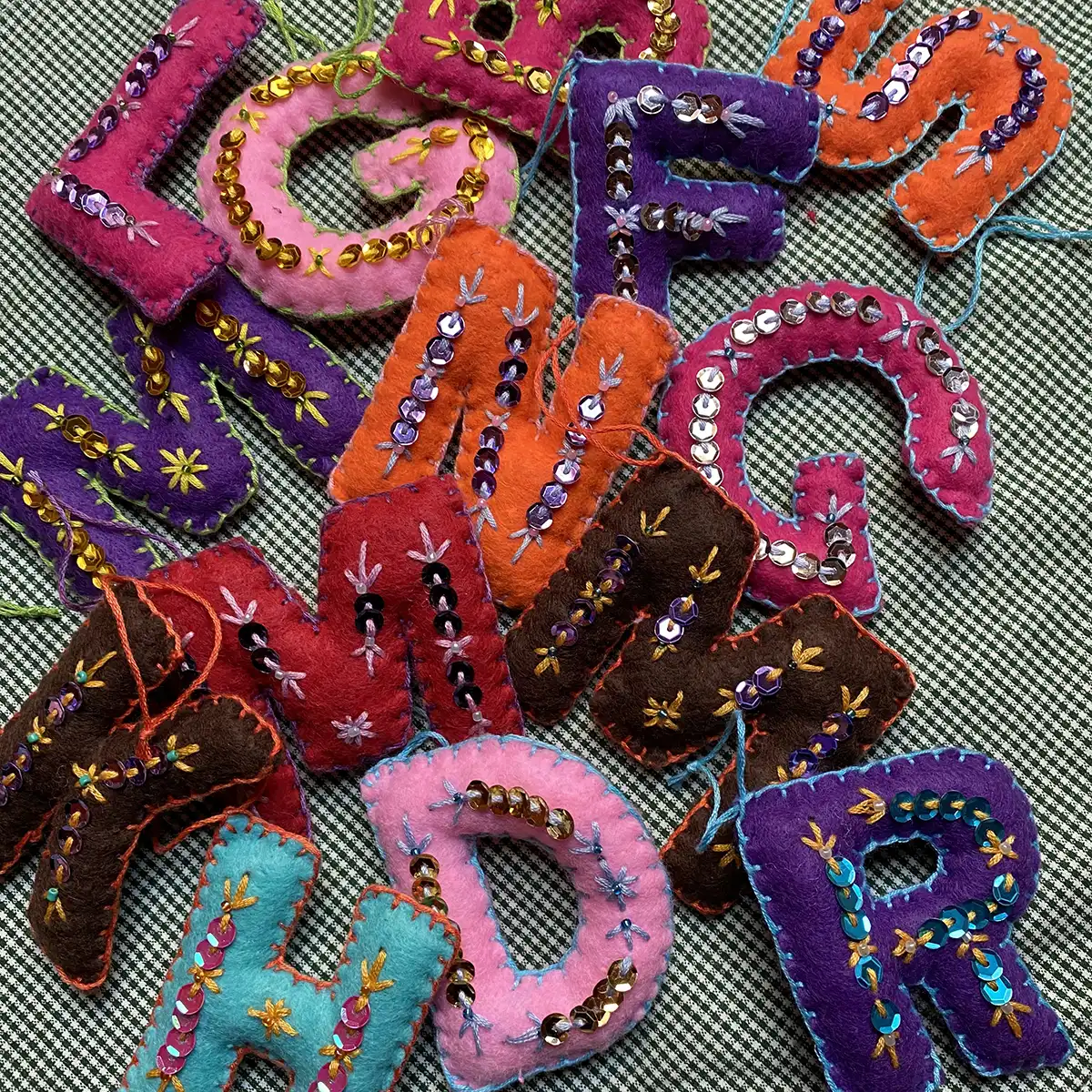 Felt letter ornaments by dera.Heat